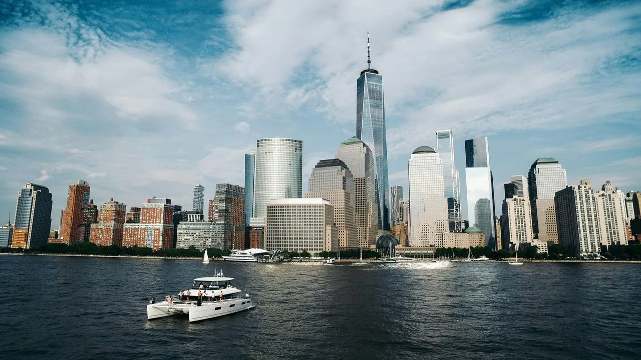 Lower Manhattan and One World Trade Center seen across the water from New York Harbor
